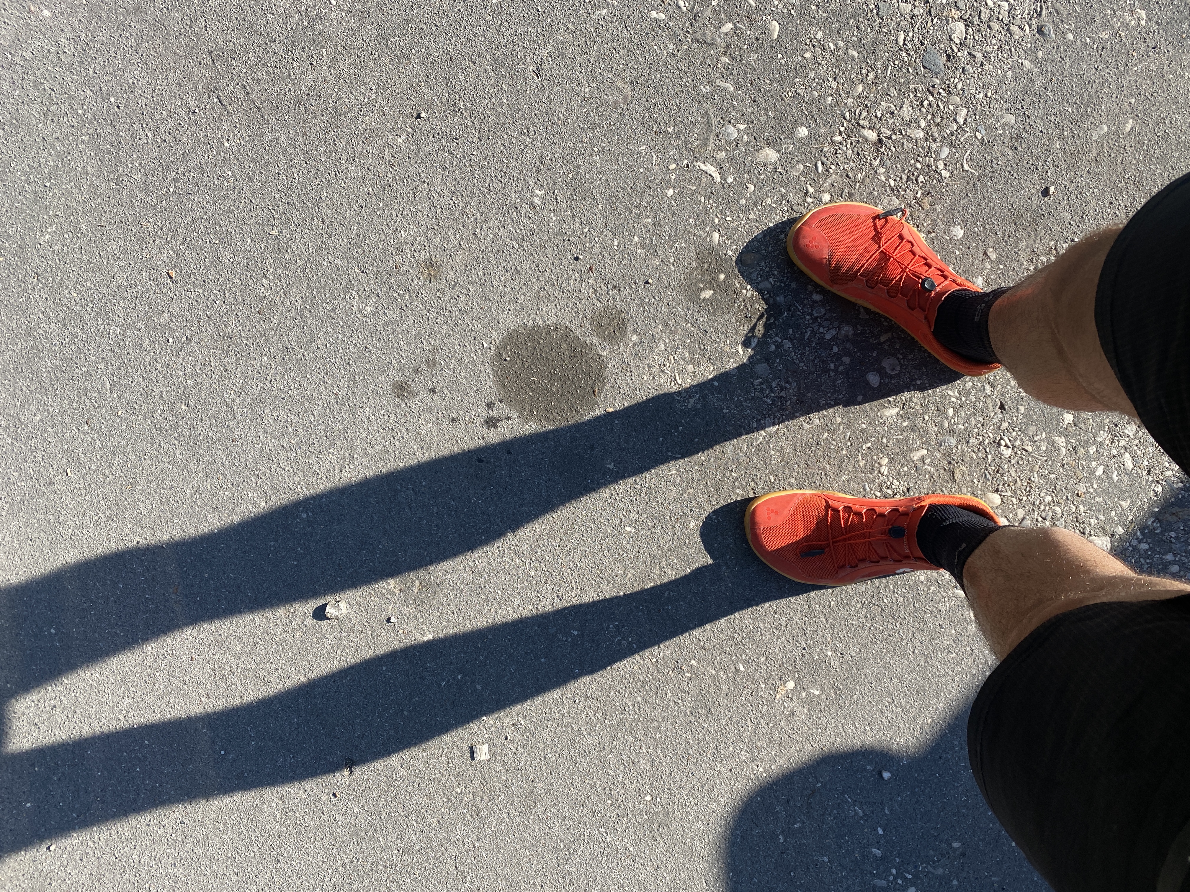 Red Vivobarefoot trail shoes